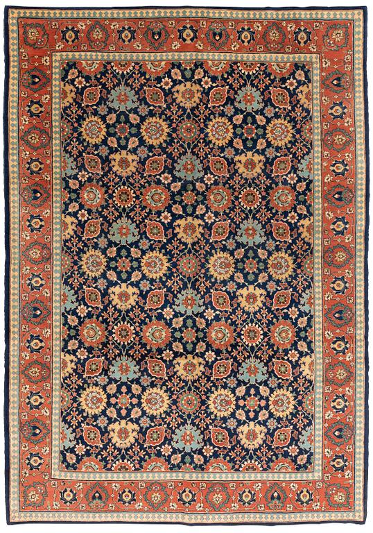 A Tabriz carpet of Harshang design, c. 353 x 250 cm.