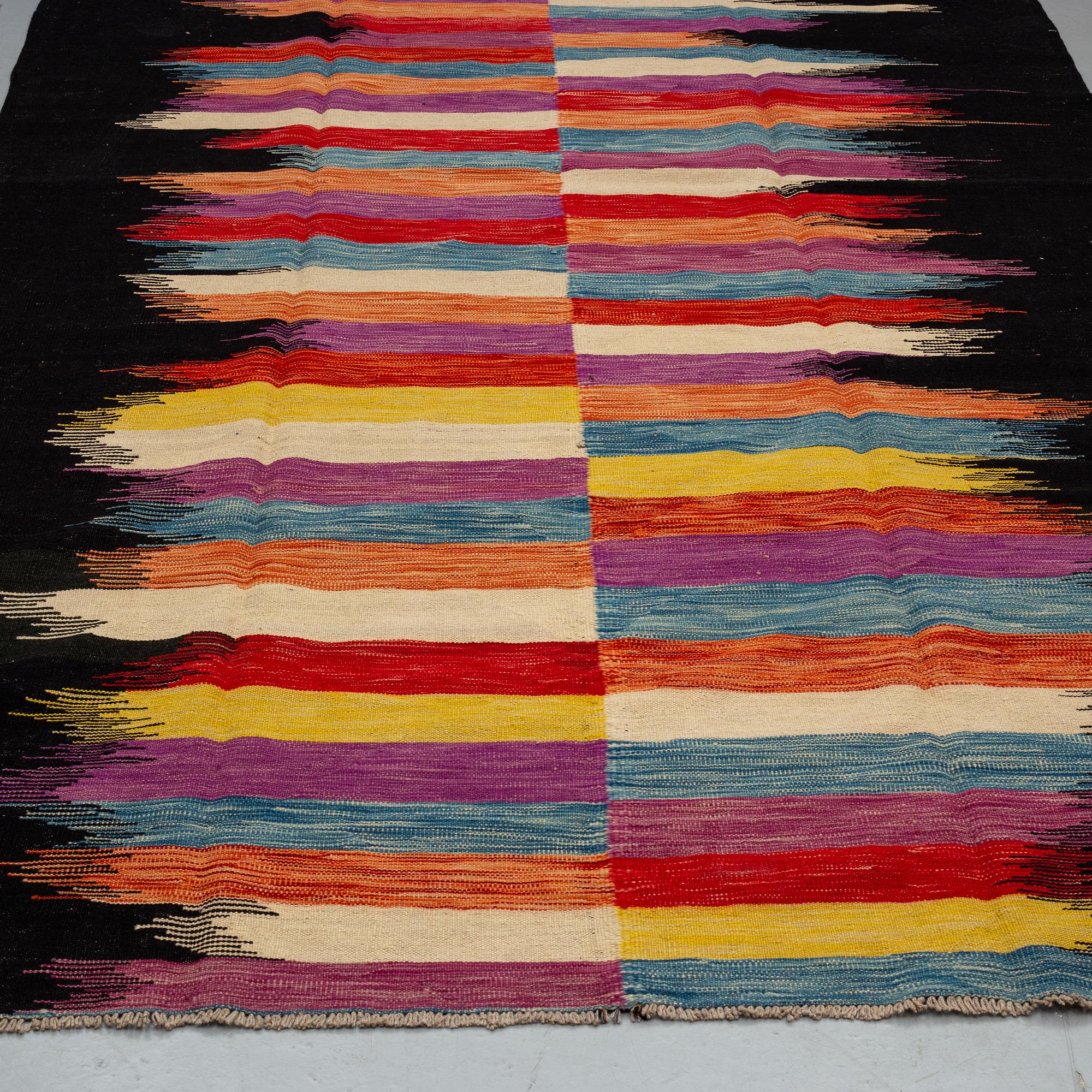 A carpet, kilim 302 x 197.
