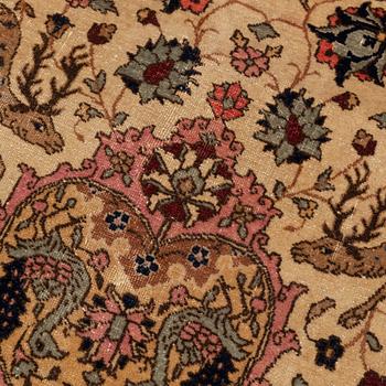 An antique Benlian Tabriz carpet, signed Jabarzade, ca 466 x 323 cm.