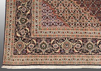 A CARPET, Tabriz part silk , so called 40 Radj, ca 298 x 202 cm.