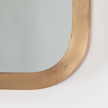 A brass mirror, possibly by Josef Frank for Svenskt Tenn.