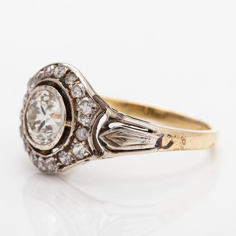 A 14K gold/silver ring, set with old-cut diamonds totalling approximately 0.73 ct.