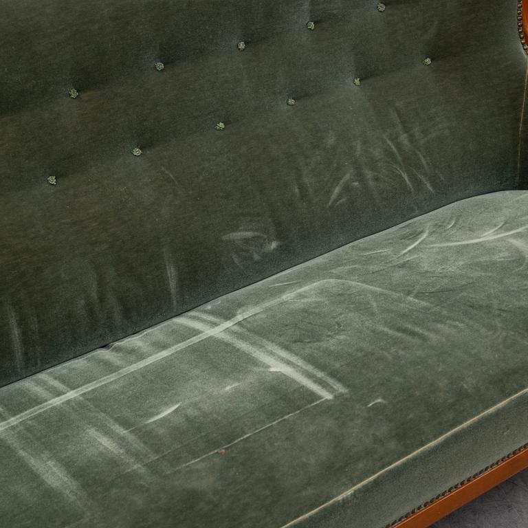 CARL MALMSTEN, an 'Advokaten' mahogany sofa.