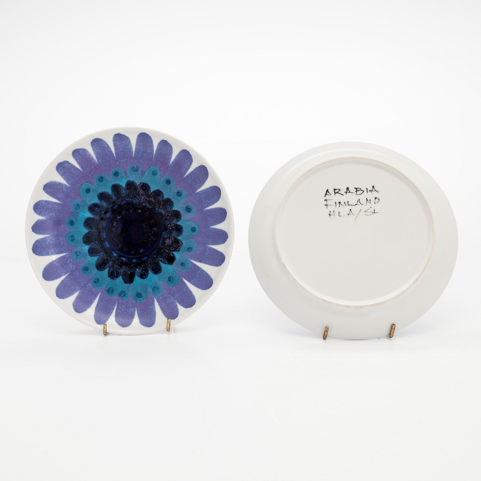 Hilkka-Liisa Ahola, a ceramic serving dish and ten side plates, signed HLA, Arabia Finland.