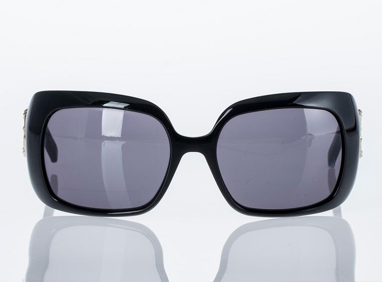 AURINKOLASIT, Gucci.