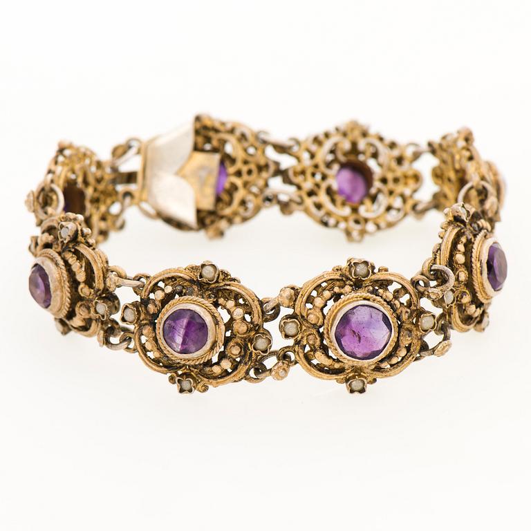 A BRACELET, goldplated silver, amethysts, pearls. Import marks, Kulta-Kontu, Helsinki Finland 1952.
