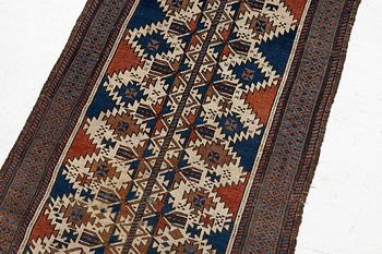 An antique Baluch rug, East Persia, c. 147 x 45 cm.