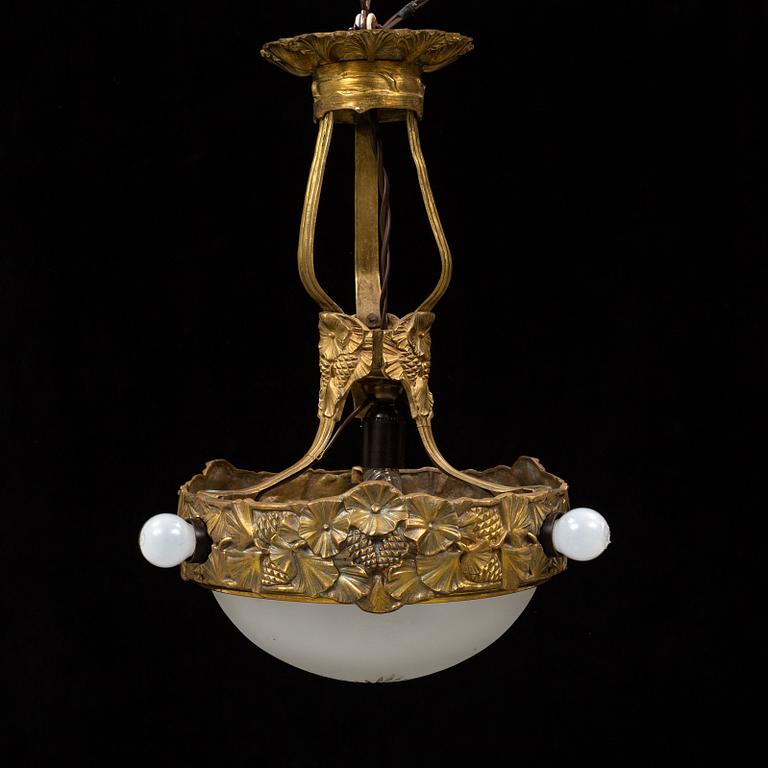 An Art Nouveau bronze ceiling light, Böhlmarks, 1907-24.