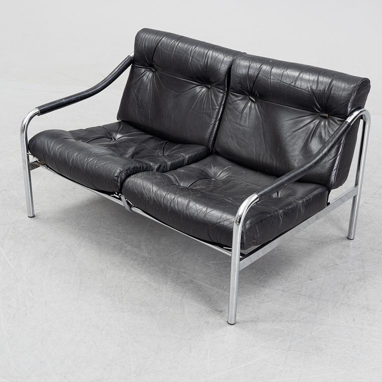A 1960's leather upholstered 'Kadia' sofa  by Tim Bates for Pieff.