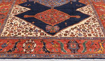 A Zigler, Heris Design carpet, 298 x 247 cm.