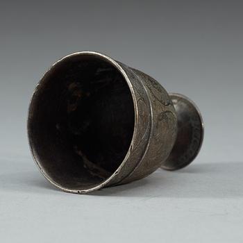 A silver stemcup, presumably Tang dynasty.