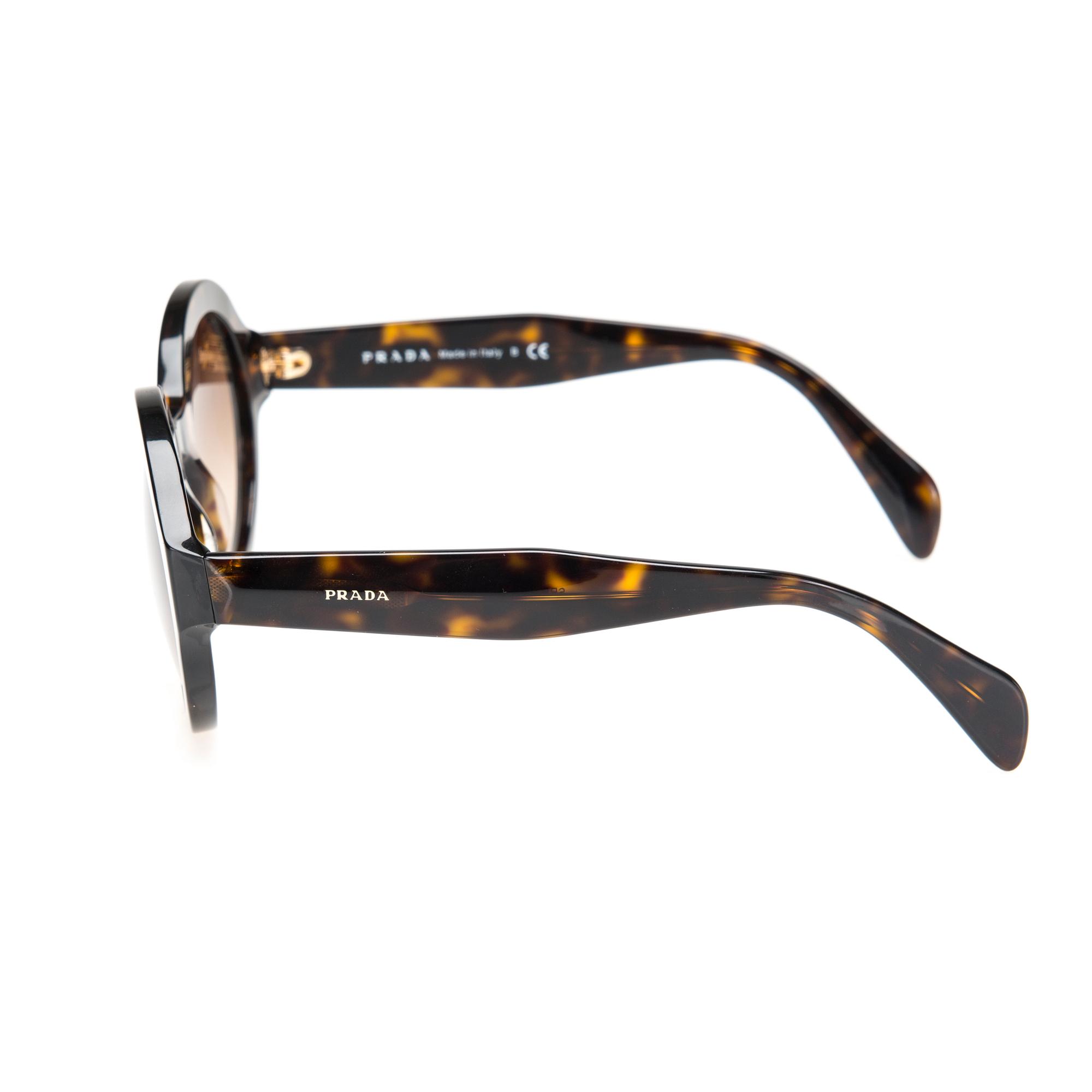 SOLGLASÖGON, Prada.