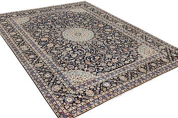 A Keshan carpet, c. 392 x 290 cm.