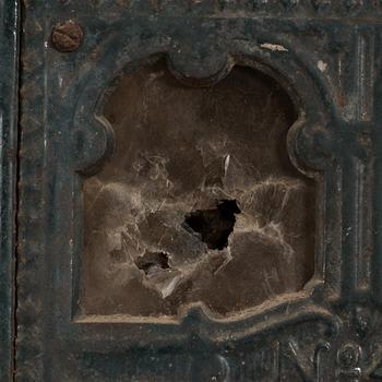 A cast iron stove, around 1900.