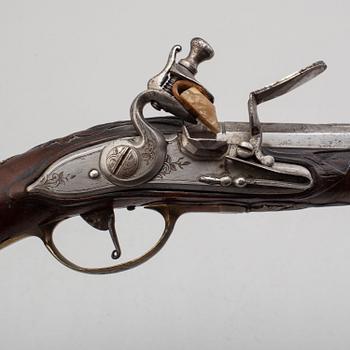 A Flintlock pistol by Friedrich Carlson (Dresden 1700-1719).