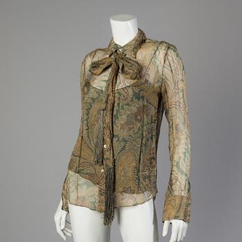 Jacket and blouse by Ralph Lauren.