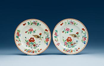 A set of seven famille rose dinner plates, Qing dynasty, Qianlong (1736-1795).