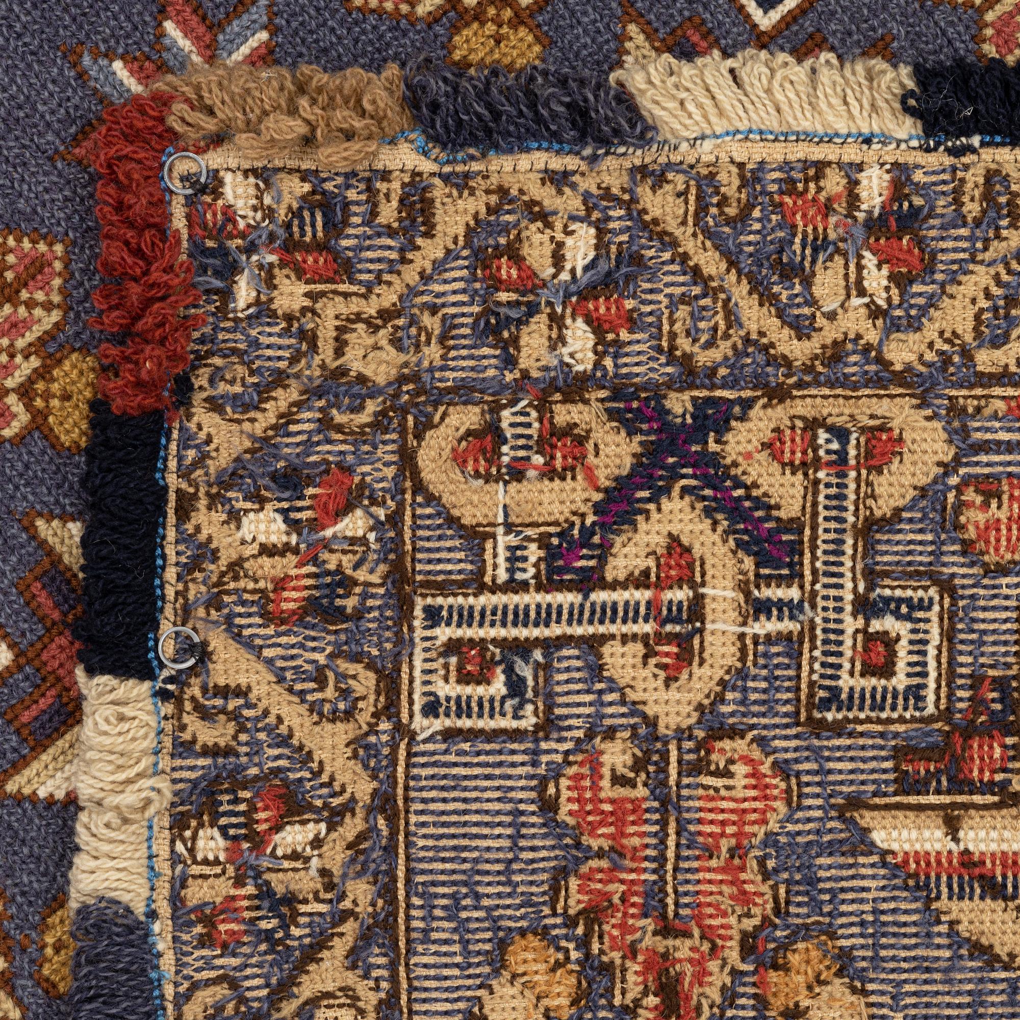 A twizt stich bench cushion from Scania. C 187 x 79 cm Circa 1900.