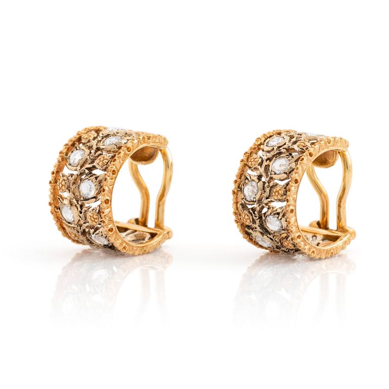 A pair of 18K gold Buccellati earrings set with rose-cut diamonds.