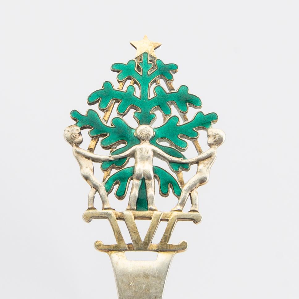 Anton Michelsen, Christmas cutlery, 21 pieces, gilded sterling silver and enamel, Denmark total weight 888 grams.