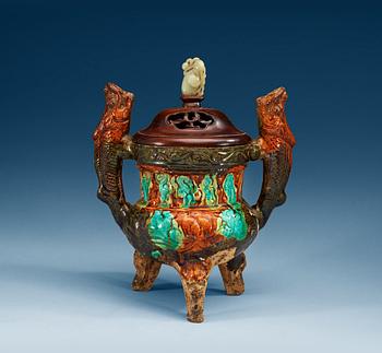 1240. A brown, green and turkoise glazed tripod censer, Ming dynasty.