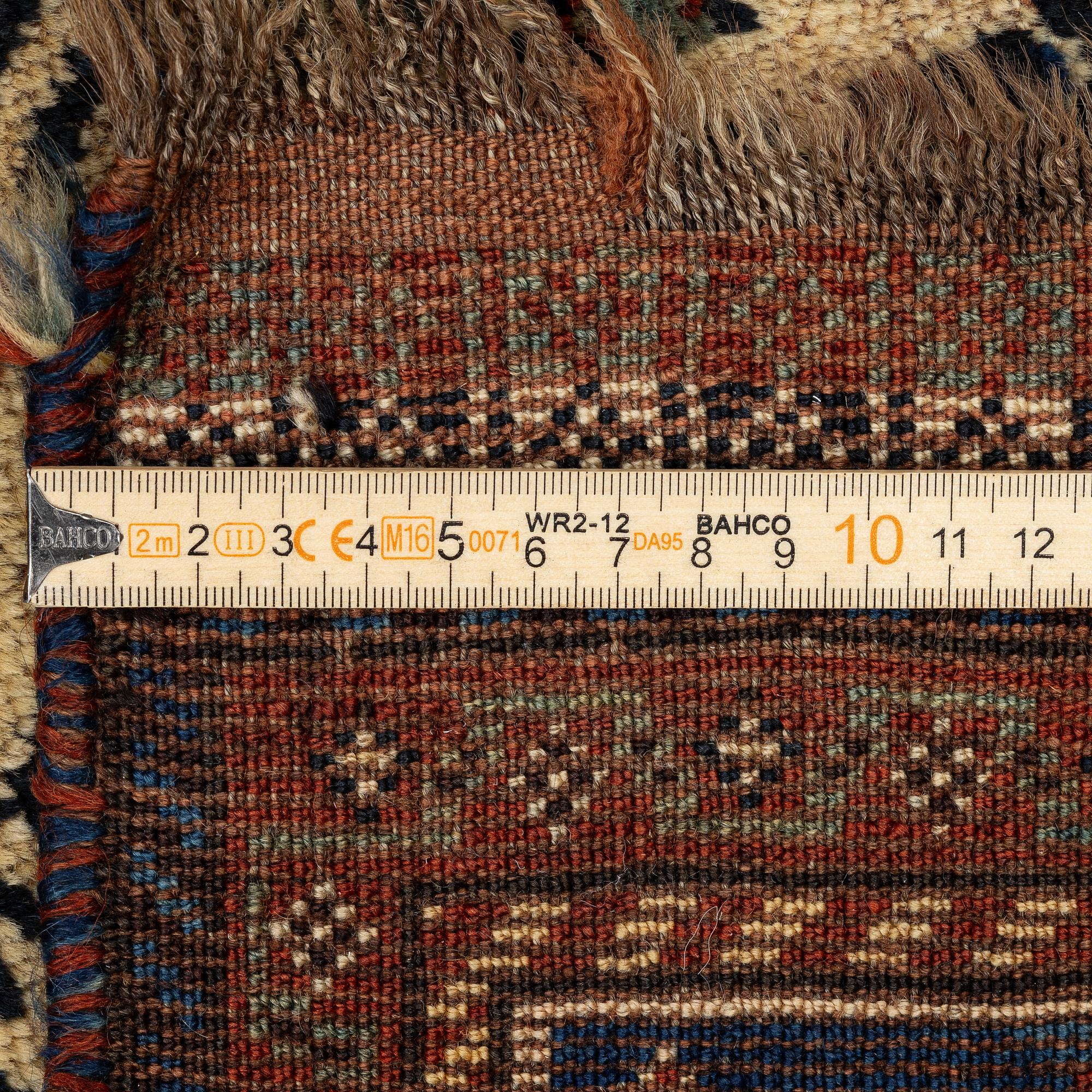 An antique Qashqai rug, South Persia, c. 189 x 142 cm.