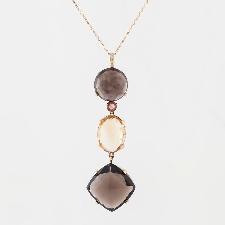 A smokey quartz and citrine pendant.