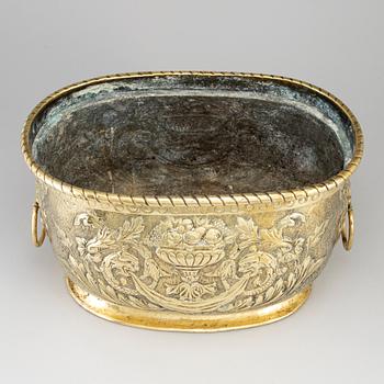 An 18th century brass champagne cooler.