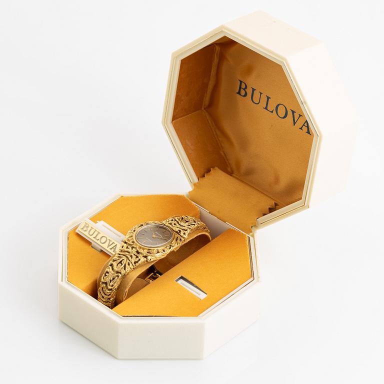 18K gold Bulova watch.