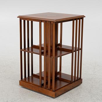 A revolving bookcase, late 20th century.