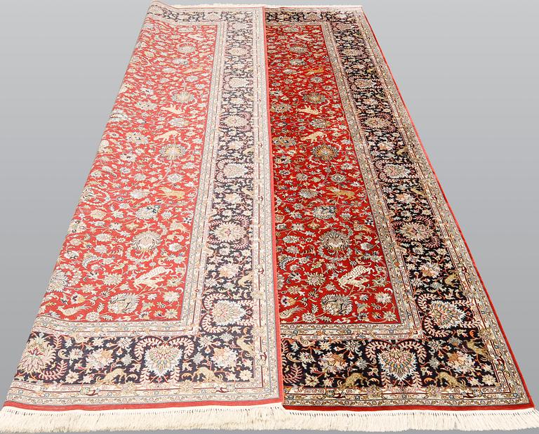 A pictoral orientalisk silk carpet, ca 284 x 180 cm.