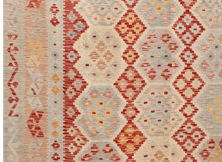A Kilim carpet, c 391 x 317 cm.