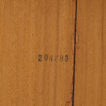 Niles Otto Møller, a rosewood veneered table with four chairs, JL Møller, Denmark, 1950's/60's.