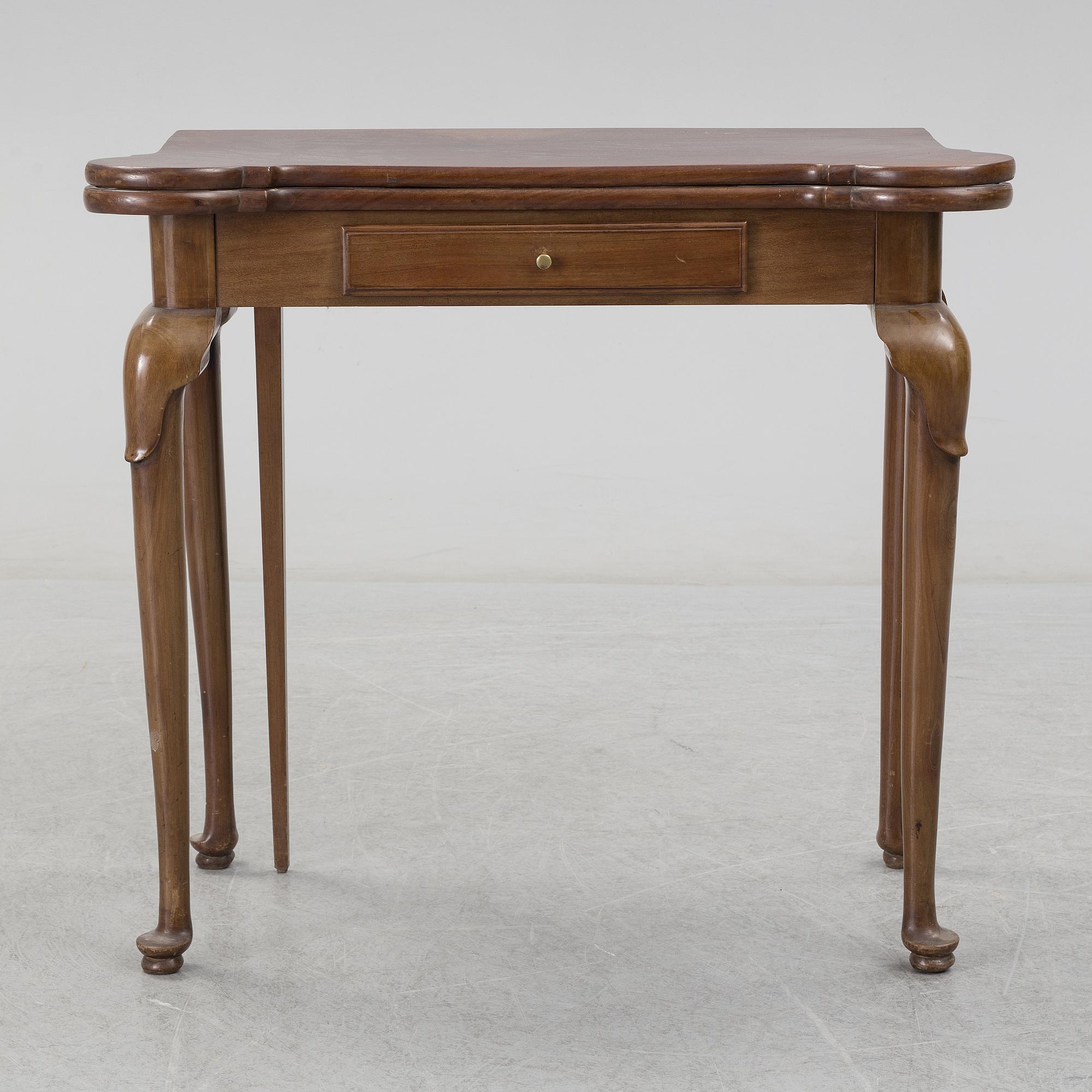 A mahogany games table, 18th Century.