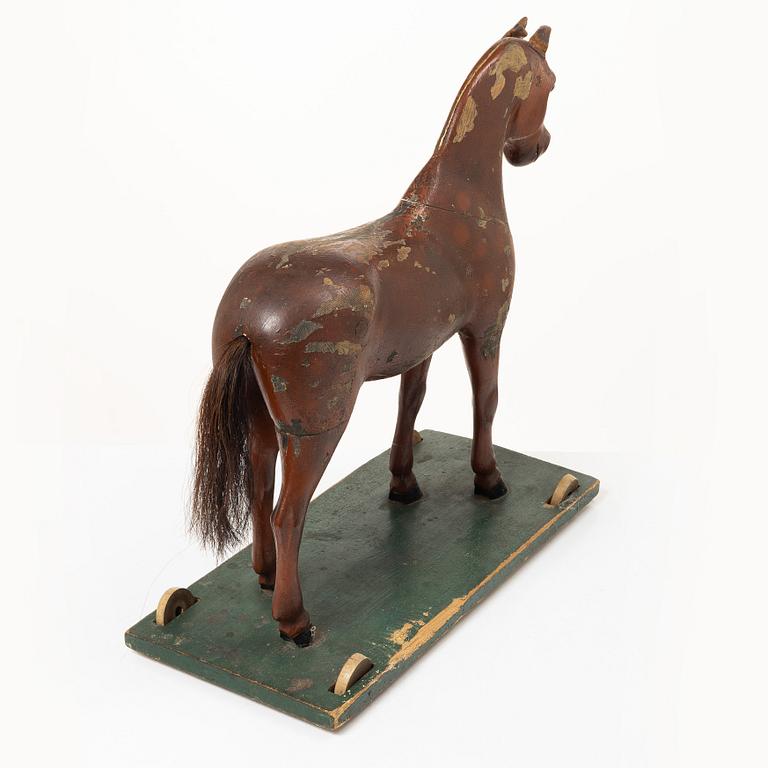 A toy horse, early 20th century.