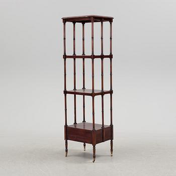 A Mahogany shelf, ca 1900.