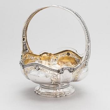 A silver fruit basket with cut glass liner, Finnish import marks Helsinki 1929.