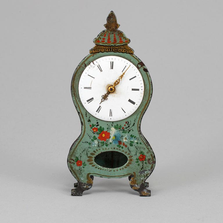 A 19th century tin plate miniature table clock.