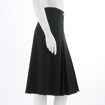 CÉLINE, a green wool skirt, size 48.