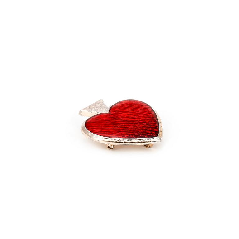 YVES SAINT LAURENT, a heart shaped brooch.