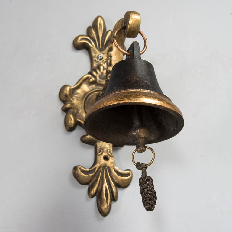 A bronze Ship's Bell mounted on wall bracket, from second half of the 20th century.