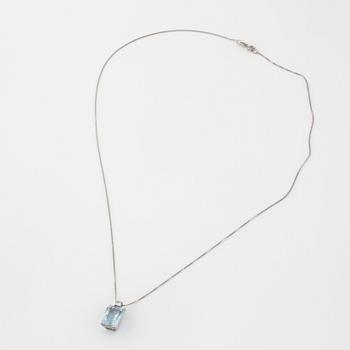 A aquamarine and briliant cut diamond pendant.