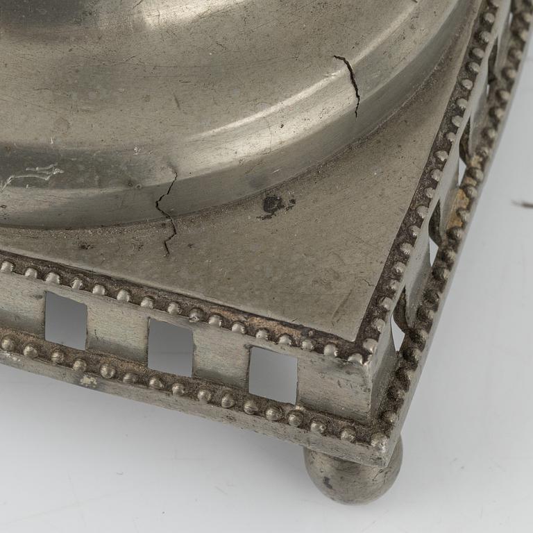A matched pair of pewter candle sticks, 19th Century.