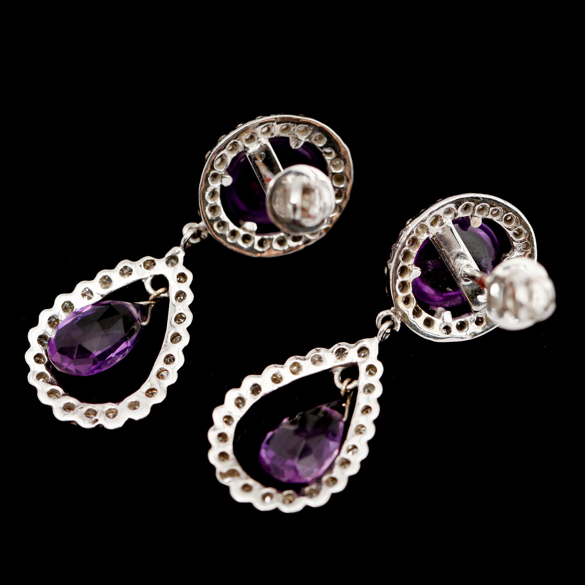 ÖRHÄNGEN, 1 par, vitguld, ametister, tot 8.90 ct samt diamanter 1.65 ct.