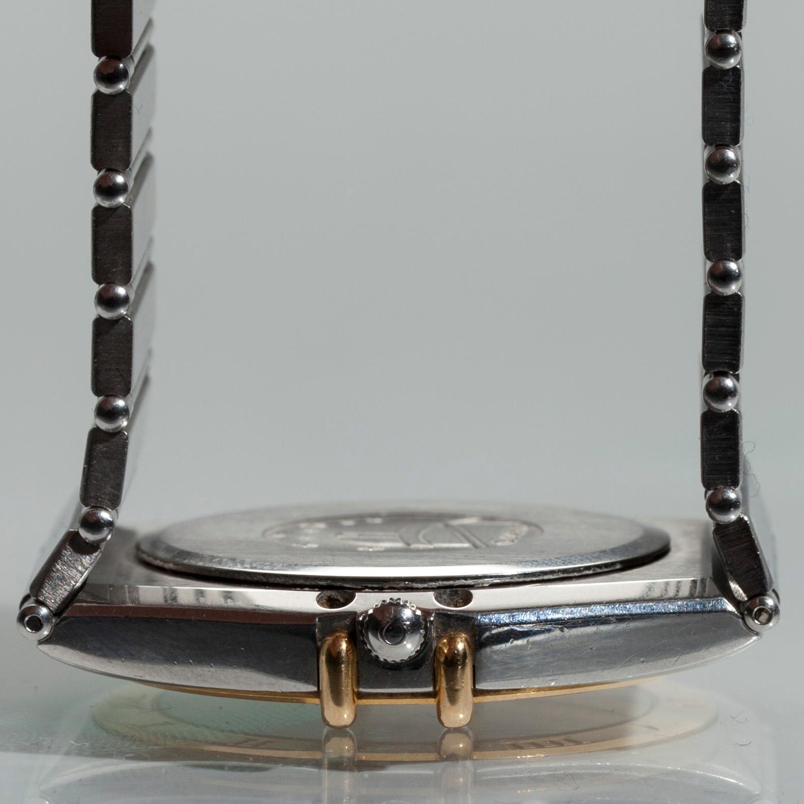 ARMBANDSUR, herr, Omega Constellation Chronometer, guld och stål. 1900-talets slut.