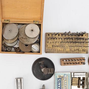 Watchmaking tools and spare parts, including a lathe by Lorch.