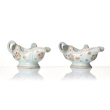 A set of two iron red and gold sauce boats, Qing dynasty, Qianlong (1736-95).