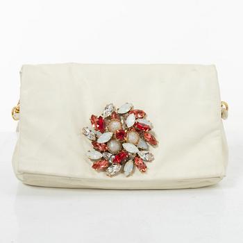 Miu Miu, a handbag/clutch.