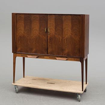 KURT ØSTERVIG, a Danish rosewood veneered drinks cabinet, 1960's.