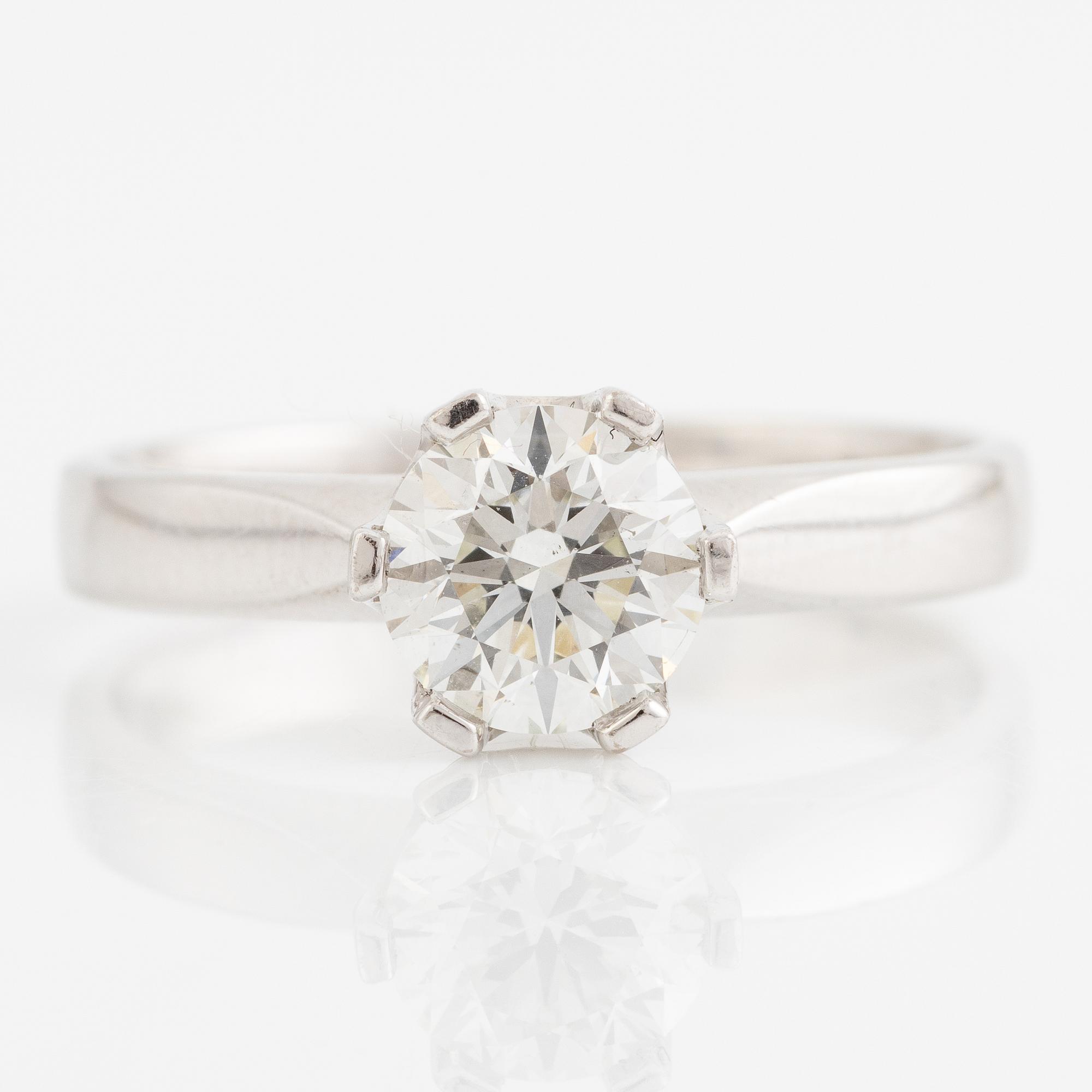 Ring, Schalins, 18K white gold with brilliant-cut diamond and accompanying report IGI.